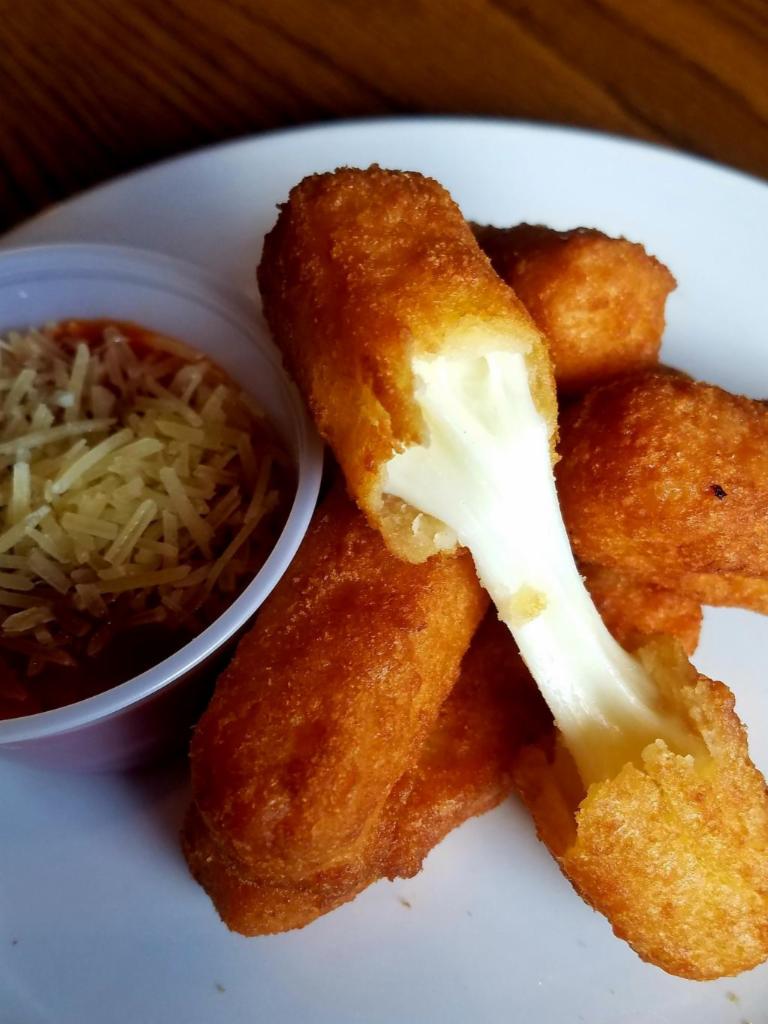 6 Piece Mozzarella Sticks · Served with a choice of dipping sauce.