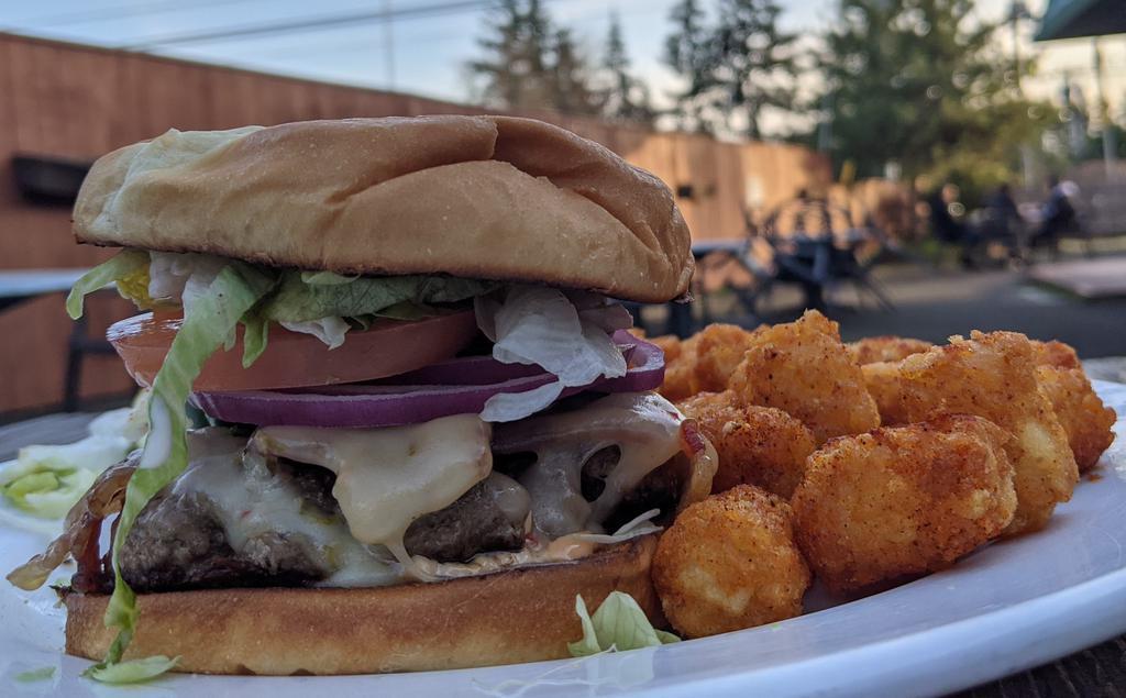 The Diablo Burger · 1/3 lb. patty with pepperjack, bacon, fresh jalapenos and chipotle mayo, red onion, lettuce & tomato on an artisan bun. Choice of 1 side. 