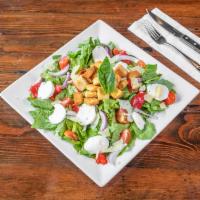 Classic Salad · Romaine, fresh bocconcini, roasted peppers, cherry tomato, red onion, crouton, basil, and pe...