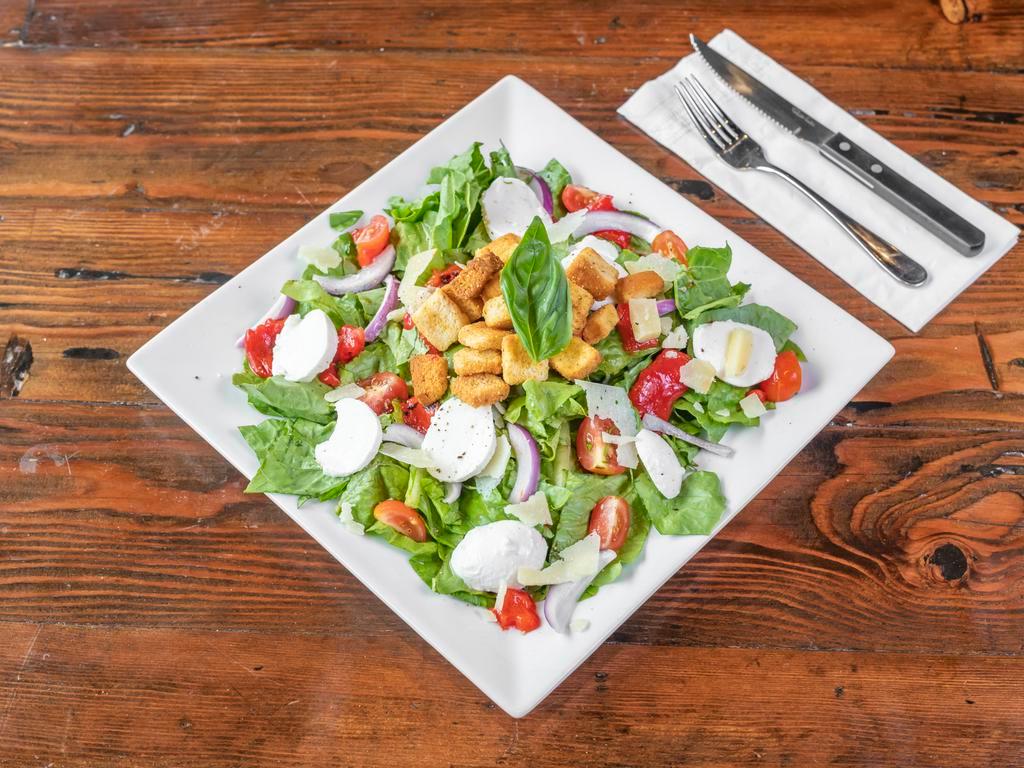 Classic Salad · Romaine, fresh bocconcini, roasted peppers, cherry tomato, red onion, crouton, basil, and pecorino.