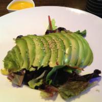 Avocado Salad · Sliced avocado with a variety of vegetables. 