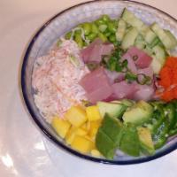 Amazing Yellowtail Poke · Yellowtail, snow crab salad, avocado, cucumber, edamame, mango, masago, scallion and ponzu s...