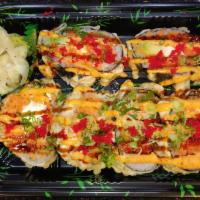 Godzilla Roll (6 Pcs) · Deep Fried Spicy Tuna with Chef's sauce, scallion,cheese, avocado, tobiko on the top