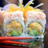 Snow White Roll · White Tuna, Spicy mayo, avocado, crunch inside. topped with snow crab, yellow tobiko.