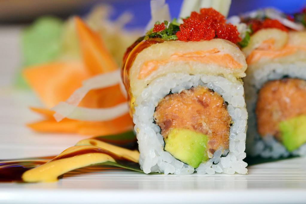 Fusion Roll · Spicy Tuna, avocado, Scallion inside, topped with tempura salmon tobiko, spicy mayo&eel sauce.