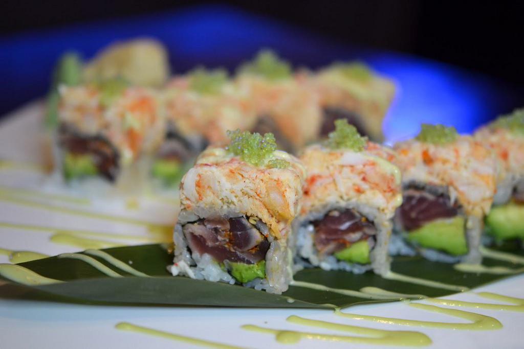 Spicy Girl Roll · Pepper Tuna, avocado, scallion inside. topped with lobster salad wasabi tobiko, wasabi sauce.