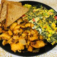 32. Veggie Omelette · Broccoli, tomatoes, peppers and spinach.