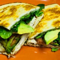 121. Turkey Avocado Panini · Oven gold turkey, avocado, mozzarella cheese, tomato, and fresh spinach.