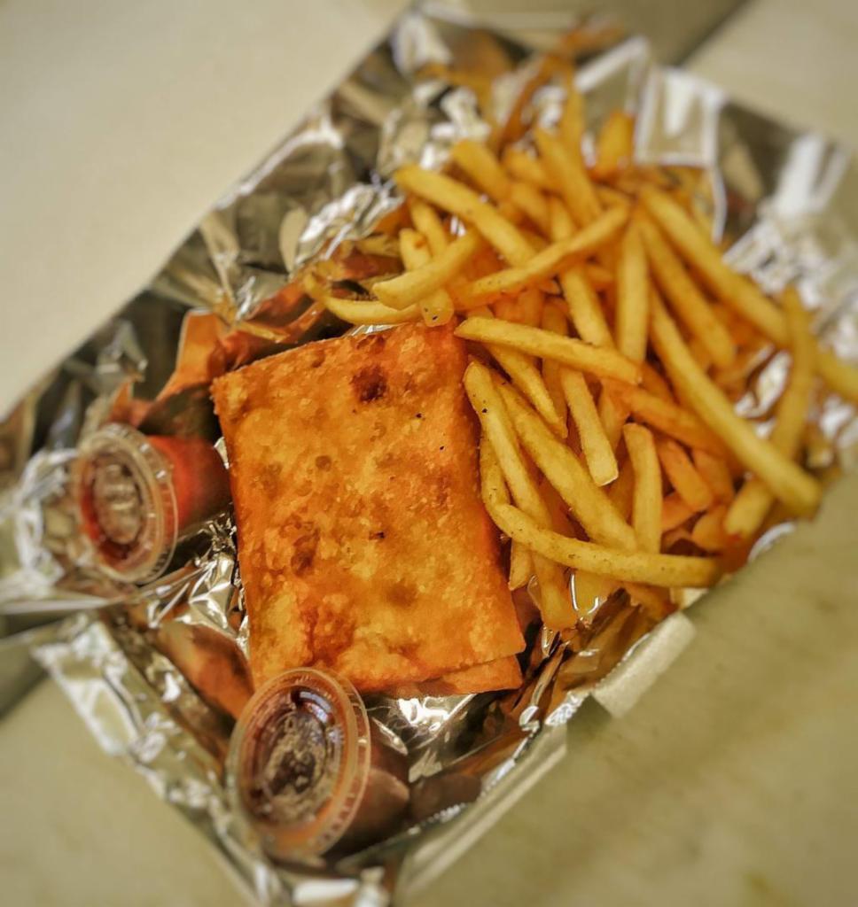 Pizza Puff Sandwich · Served with fries and mild sauce.