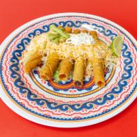 5 Rolled Tacos · Topped with cheese. Served with guacamole or sour cream.