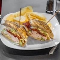 Turkey Bacon Avocado Sandwich · Natural turkey breast, thinly sliced with fresh avocado spread, crispy bacon, lettuce, tomat...