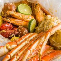 Combo B · Live crawfish, big head shrimp, snow crab legs, corn and potato.