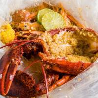 Combo C · Canada lobster, live crawfish, baby squid, corn and potato.