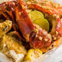 Combo E    · Canada lobster, Dungeness crab, king crab legs, big head shrimp, corn and potato.