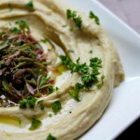 Hummus · Signature creamy dip of fresh whole chickpeas, tahini, garlic, fresh squeezed lemon juice, &...