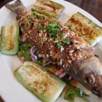 Fish  · Crispy & tender whole fish of the day, seasoned with fresh squeezed lemon juice, garlic, Isr...