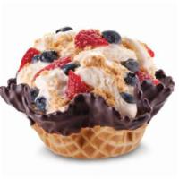 Cheesecake Fantasy · Cheesecake ice cream with graham cracker pie crust, blueberries and strawberries.