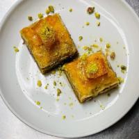 Baklava · Layered filo pastry with walnuts garnish with pistachios
