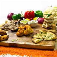 37. Golden Special Mix Grill · Platter served with tandoori chicken, chicken tikka, chicken malai kebab, chicken seekh keba...