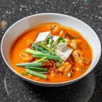 6. Kimchi Stew · Spicy stew made with ripened. Kimchi, pork, tofu, garlic, onion, scallion and radish. Servin...