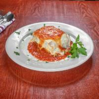 Homemade Lasagna · House signature ragu sauce, ricotta mozzarella cheese and marinara.