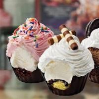 6 Pack Variety of Cupcakes · Sweet Cream Cupcake: A rich Chocolate Cup filled with a layer of Yellow Cake, Fudge and Swee...