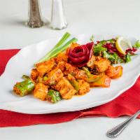 Dry Chilli Tofu · Cubes of curd bean sauteed with fresh chillies and ginger garlic paste
