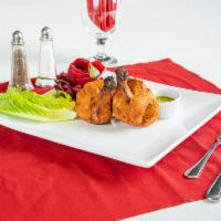 Tandoori Chicken Half · Chicken Marinated with yogurt,hearbs and spices
