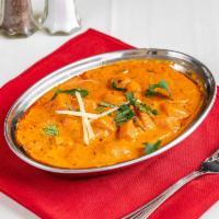 Navratan Korma · 9 garden fresh vegetables gently cooked in mild spices and cream, sprinkled with nuts.