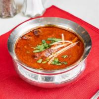 Rogan Josh · A signature dish from Kashmir, consists of succulent pieces of goat or lamb in cardamon anis...
