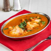 Goa Fish Curry · Jumbo fish cooked in coconut based sauce.