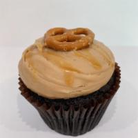 Caramel Crunch · Our signature chocolate cake topped with caramel buttercream frosting and finished with cara...