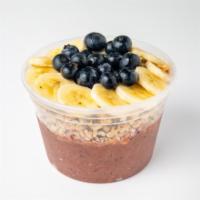 Divine Glow Bowl · Organic pitaya, mango, spinach, strawberries, banana and 100% apple juice. Toppings: hempsee...