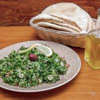 Tabouli Salad · Parsley, wheat germ, scallion and tomato with oil and lemon dressing. 