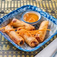 1. Crispy Spring Rolls · 4 pieces. Fried Thai spring roll stuffed with mixed vegetables, served with Thai plum sauce.