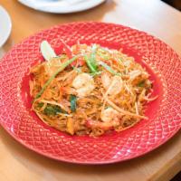 22. Pad Thai · Stir fried rice noodles with egg, scallion, bean sprouts topped with crushed peanuts. 