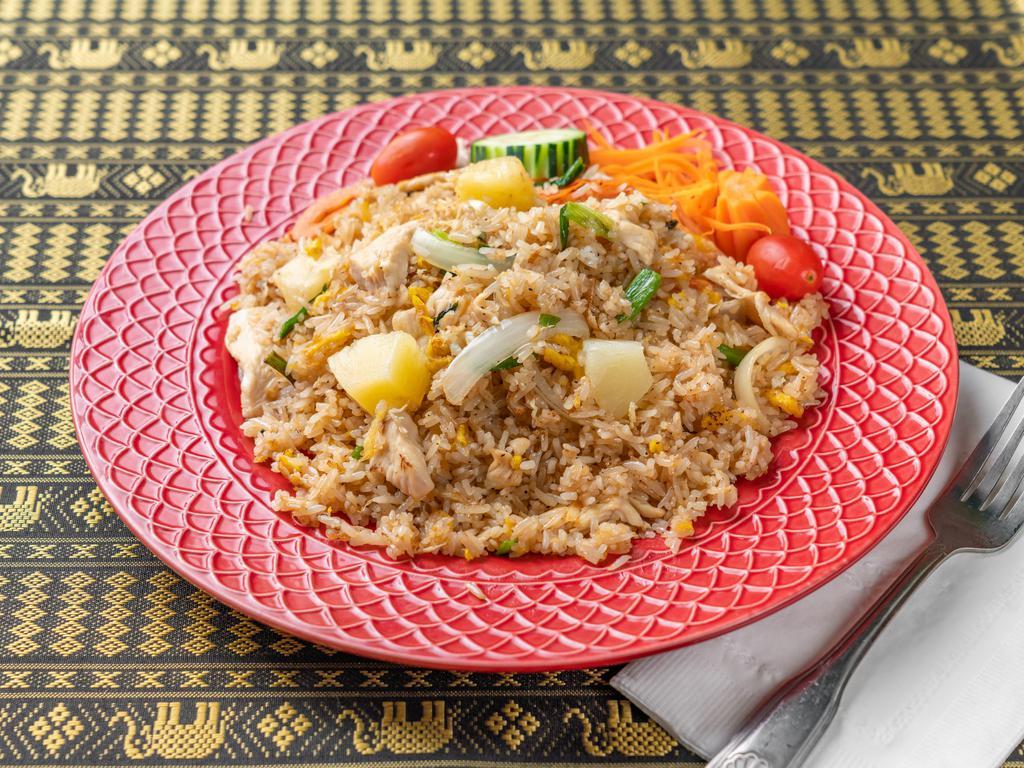 28. Pineapple Fried Rice · Pineapple, eggs in soy sauce.