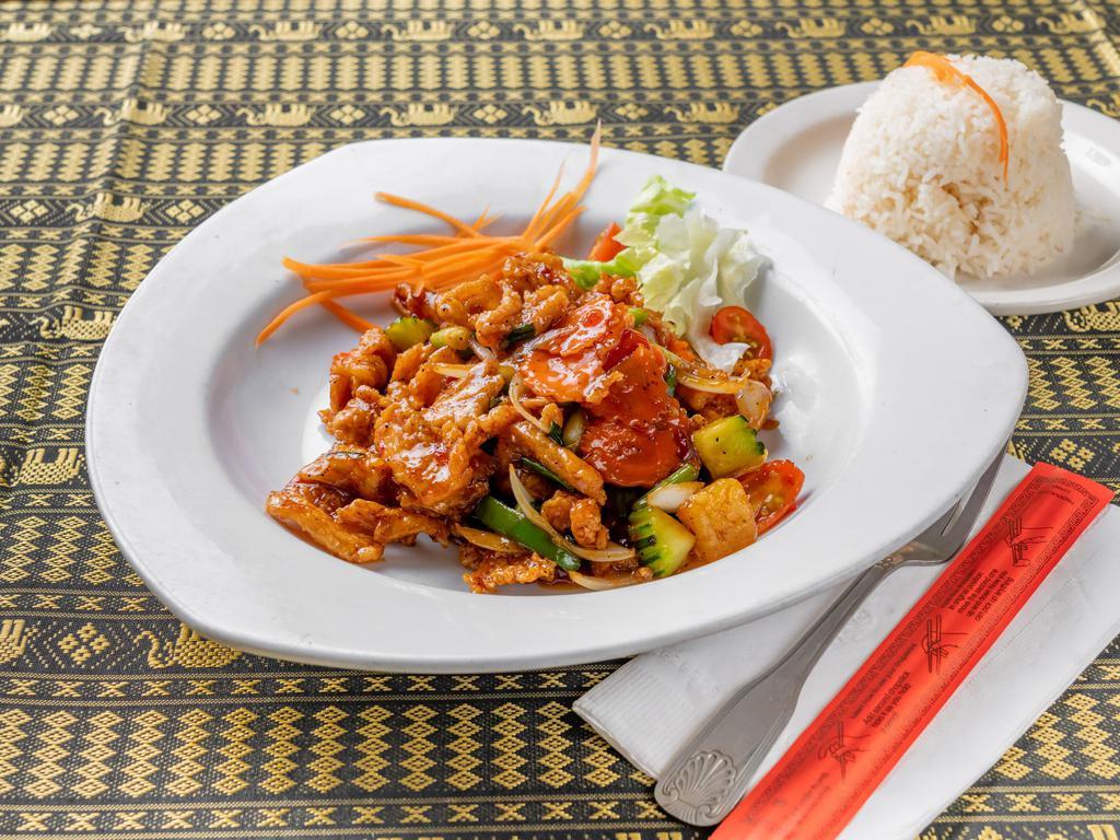 53. Sweet Sour Spicy Chicken · Sauteed with pineaple chunks and mixed vegetables in a sweet chili sauce. Choose your spiciness. Red curry for an extra charge.