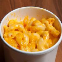 Side of Mac & Cheese · Perfectly cooked pasta smothered in luscious cheese sauce of Monterey Jack & Cheddar Cheeses.