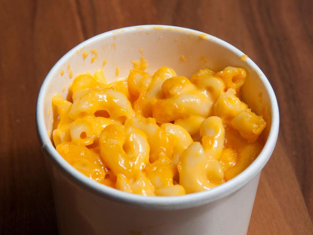 Side of Mac & Cheese · Perfectly cooked pasta smothered in luscious cheese sauce of Monterey Jack & Cheddar Cheeses.