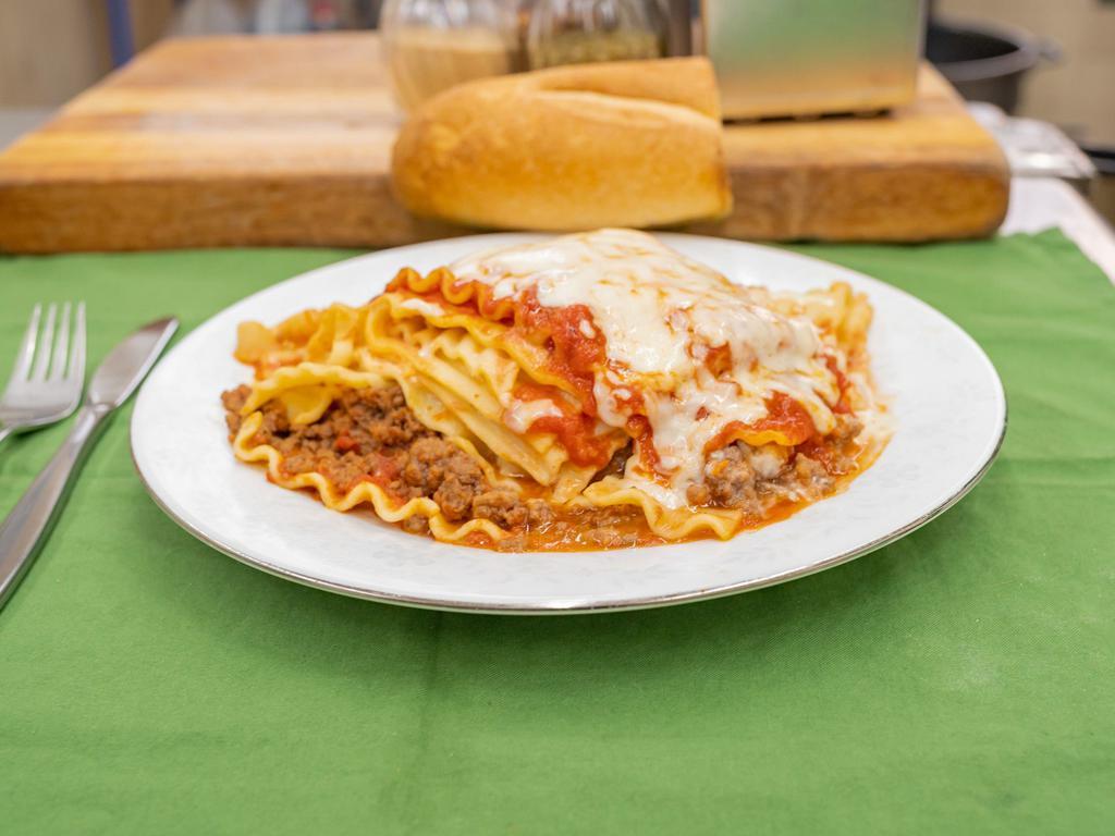 Lasagna · Layered dish with wide flat pasta. 