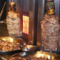 Shukraan Shawarma Platter (Chicken) · Middle eastern specialty assortment of thinly sliced chicken with pickles wrapped in thin ho...