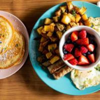 Breakfast of Champs · Pancakes or French toast, sausage or bacon, fruit or avena with 2 eggs your way and hash.