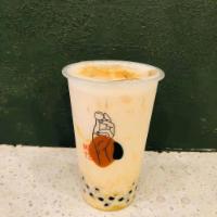 Mango Milk Tea（芒果水果奶茶）/500ml · Medium(Come with pearl~)