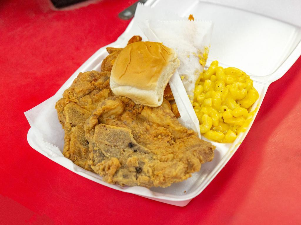 6. Pork Chops Dinner  · Fried pork chop (1pc) with two sides and a dinner roll for $8.99
Two pieces of pork chops $10.99

