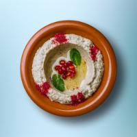 Best Ever Baba Ghanoush · Roasted eggplants mashed and mixed in with garlic, olive oil, tahini sauce, and fresh lemon ...