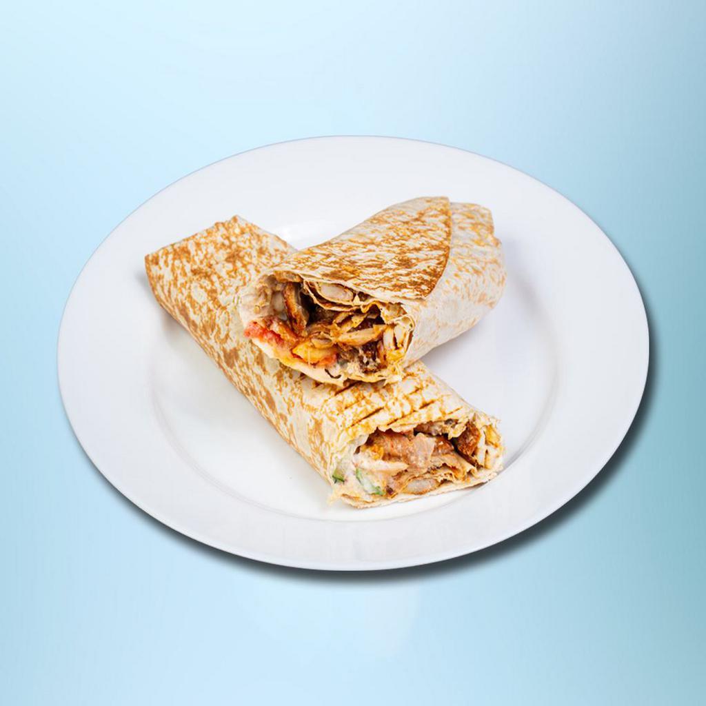Chicken Wrap  · Exotic pita bread filled with chicken, lettuce, tomatoes, choice of toppings and top it off with our famous white and hot sauce.