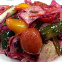 Stix Salad · Tomatoes, cucumbers, cabbage, scallions, greens, red pepper, beets, carrots, garlic and mari...