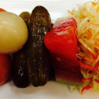 Pickled Vegetables Assorti · Marinated whole tomatoes, cucumbers, sliced cabbage. Vegetarian.