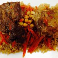Asian Pilaf · Traditional uzbek style rice steam simmered with chunk of lamb and beef, onion, carrots and ...